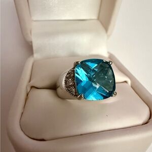 Vintage style silver ring with large blue center stone
